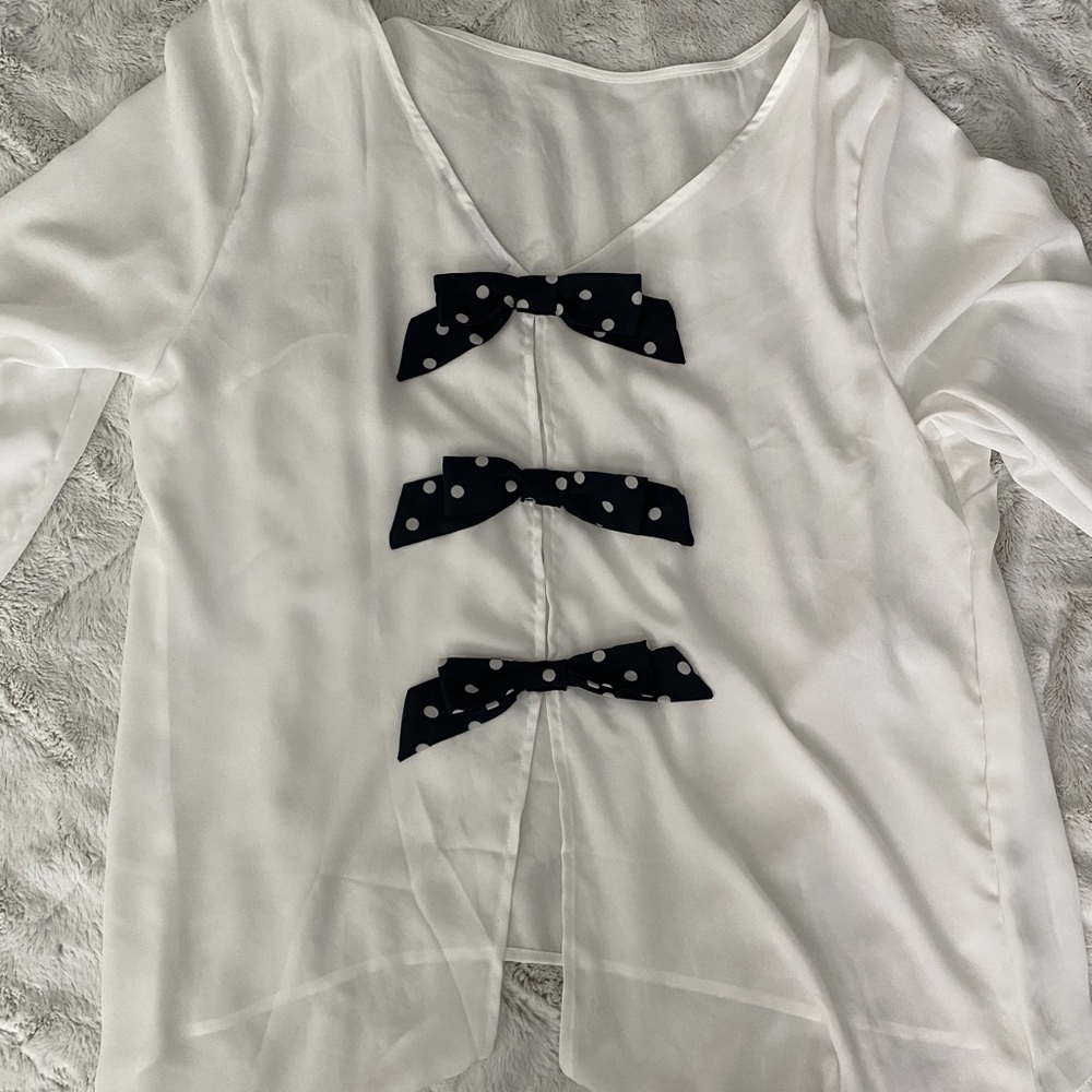 White blouse with polka dot bows